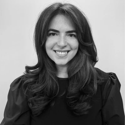 A woman smiling at camera