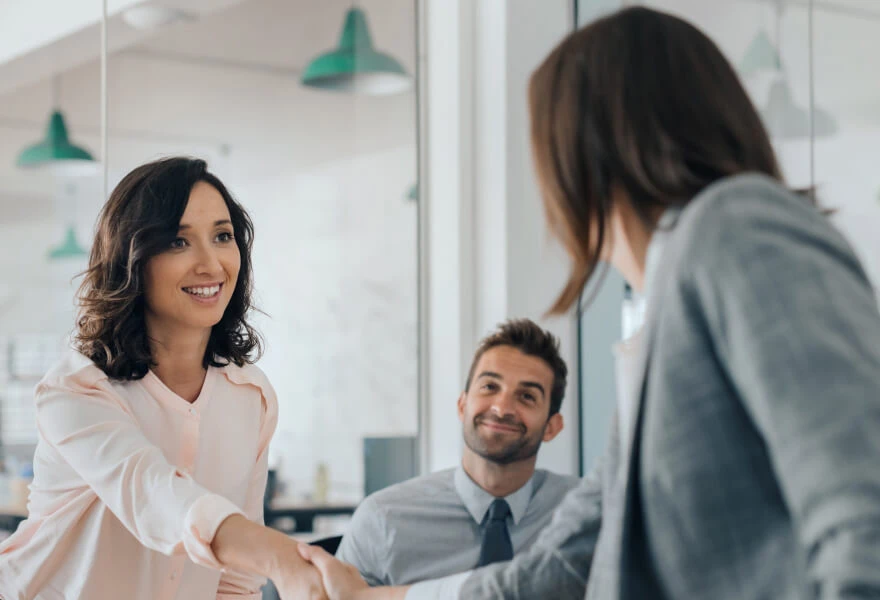 Office people shaking hands