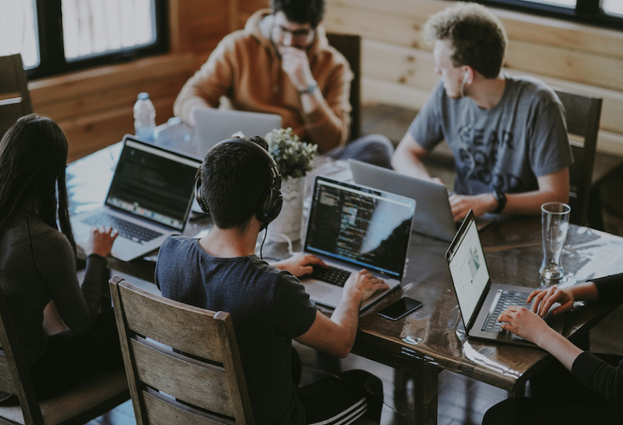 Developers working together around a desk