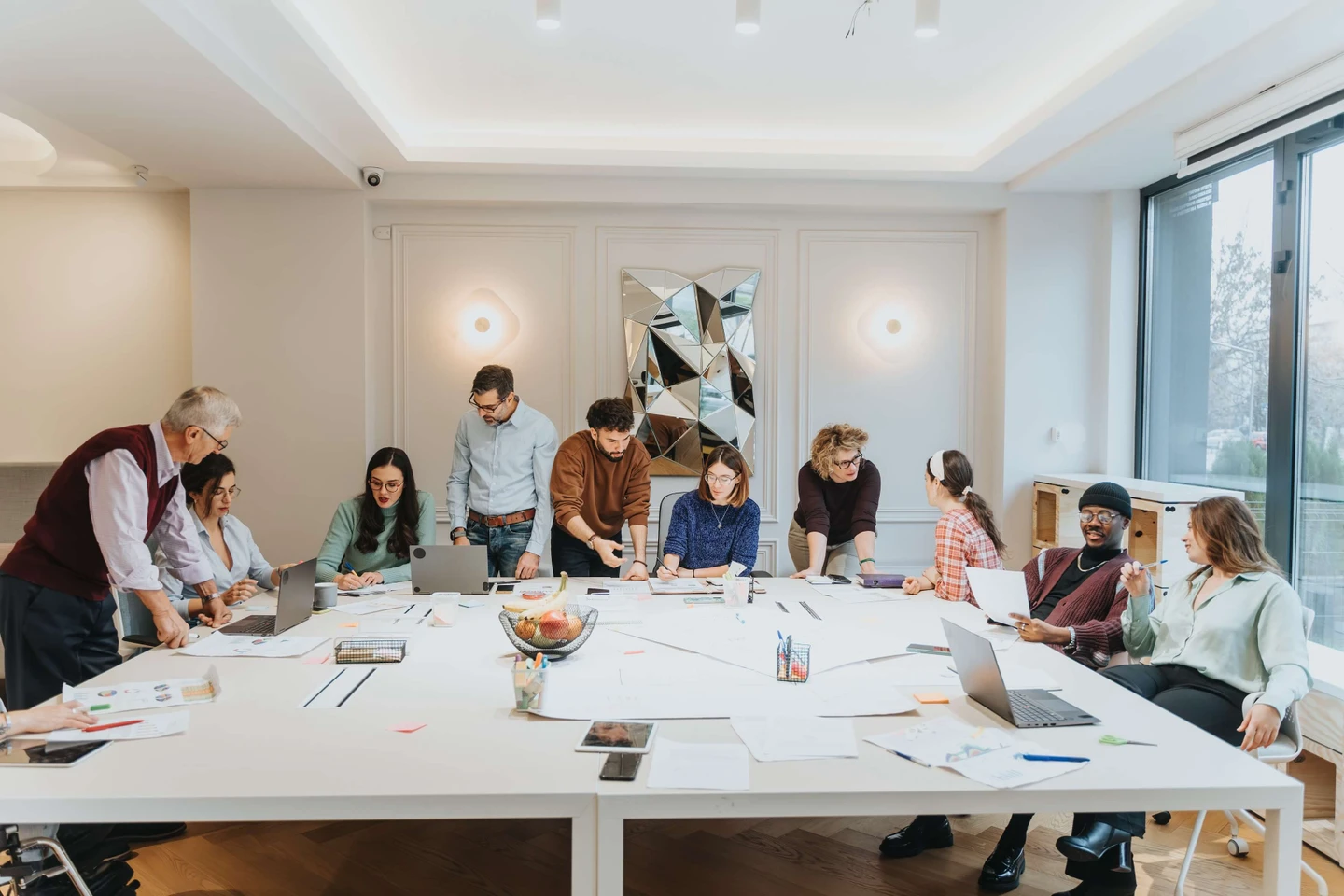 Group in office meeting room at large table