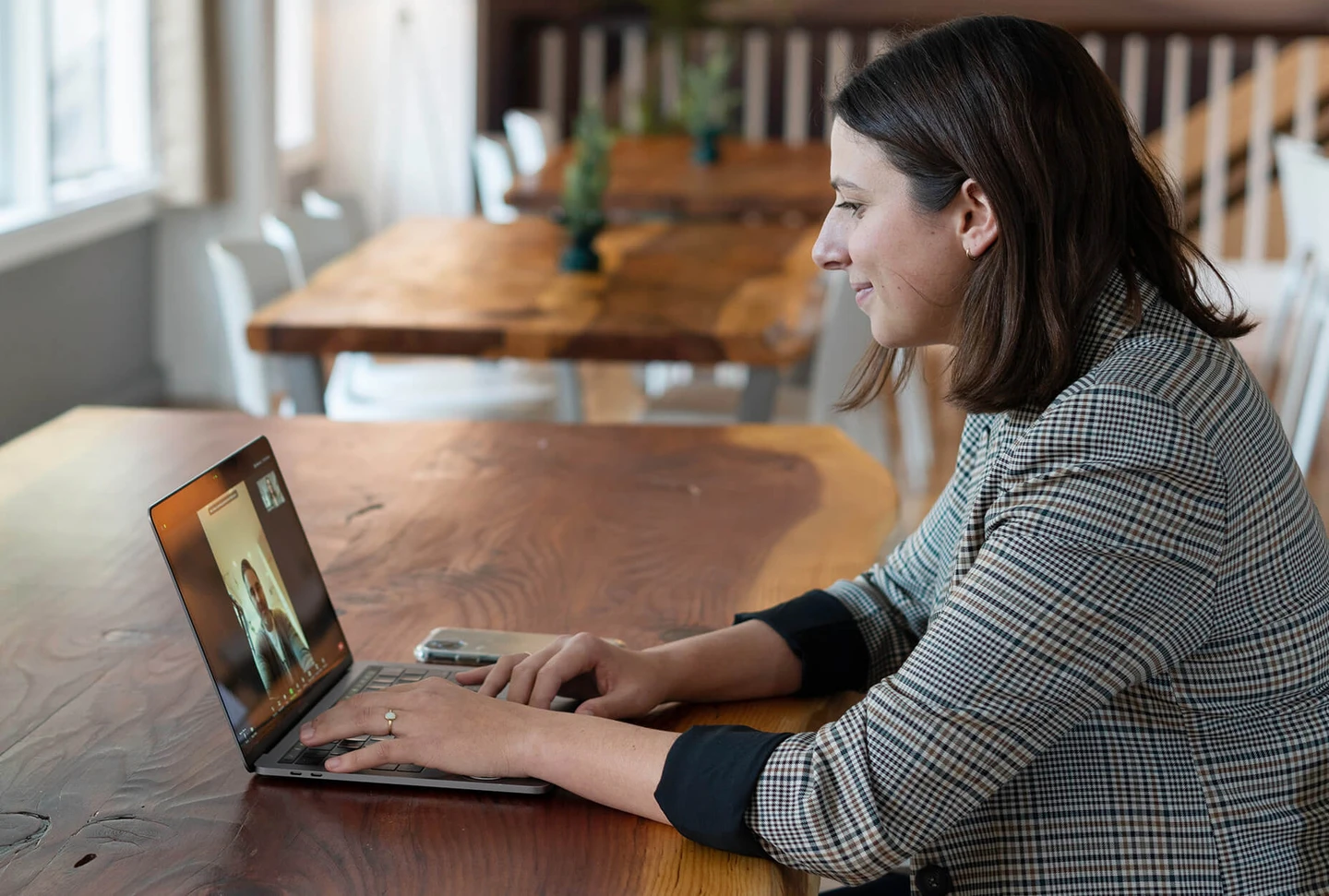 Women taking a video call on a laptop