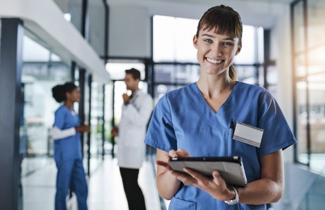 A female doctor working in a hospital